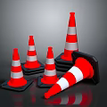 Red And White Striped Traffic Cones With Black Bases On