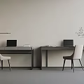 Modern Workspace With Two Gray Desks Laptops Chairs And Potted Plant