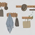 Stylish Wooden Wall Hooks on White Wall with Handbags Hat Towel and Plants
