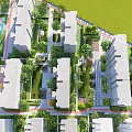 Lush Residential Landscape With Green Lawns Trees Paths And Modern Buildings