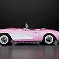 Pink Classic Convertible Sports Car With Vintage Exterior And White Wall Tires