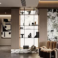 Modern Decorative Ornament Collection On Glass Display Cabinet With Marble Wall And Armchair