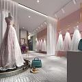 Chic Bridal Shop With Sequined Pink Wedding Dress Display And Hanging Gowns On Golden Hangers