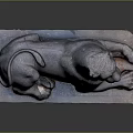 Detailed Stone Lion Sculpture Lying On Solid Stone Base With Realistic Facial Features And Claws