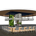 Modern Circular Bar Counter With Hanging Lights Green Plant Wall And Grey Chairs