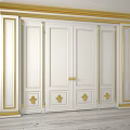 Elegant White Double Doors With Gold Decorative Trim And Ornate Accents