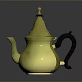 Elegant Golden Teapot With Black Handle And Decorative Top Design
