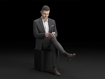 Man in Suit Sitting on Black Cube Holding and Looking at Phone 3d model