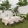 Garden Landscape Design With Outdoor Dining Table White Tablecloth Green Plants And String Lights