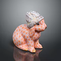 Ceramic Rabbit Figurine Wearing Patterned Hat With Orange White Fish Scale Design And Golden Paws 3d model