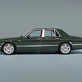 Dark Green Bentley Luxury Sedan With Classic Design And Silver Alloy Wheels