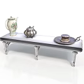 Antique Metal Shelf With Ornate Carved Legs And Three Decorative Teapots