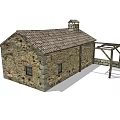 Old Stone Barn Structure with Tiled Roof Arched Wooden Door Small Windows and Stone Fence