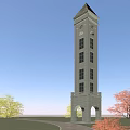 Tall Stone Clock Tower With Arched Windows And Surrounding Trees Under Blue Sky