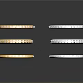 Stacked Gold And Silver Bracelets With Inlaid Decorations On Dark Background With Reflections