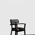 Elegant Single Chair with Patterned Backrest Dark Wooden Armrests White Wall Sunlight 3d model