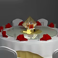 Round Dining Table Set With White Tablecloth Gold Rotating Centerpiece White Chairs Red Napkins Glassware