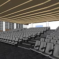 Spacious Tiered Conference Room With Rows Of Gray Seats And Large Windows