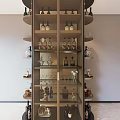 Modern Wine Cabinet With Glass Door Shelves Holding Wine Bottles Glasses And Decorations
