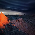 Microtopography With Erupting Volcano Flowing Lava And Surrounding Terrain Features Under Night Sky 3d model
