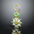 Elegant Golden Clothing Accessory Featuring Green Leaves Star Shaped Design And Central Gemstone