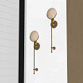 Modern Brass Wall Lamps With Spherical Glass Shade And Long Cord Switch On White Wall