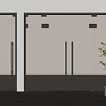 Modern Glass Sliding Doors With Metal Frames In Interior Space With Plant