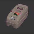 Beige Switch Panel With Two Red Buttons And Label On The Bottom