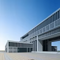 Modern Office Building Exterior With Glass Facade And Sleek Contemporary Design