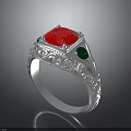 Silver Ring Featuring Red Central Gemstone Green Accent Stones And Intricate Carvings