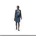 Elegant woman in blue suit with white blouse holding brown handbag against black background