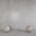 Gray Wall Tiles With Varied Textures And Round Stone Ball Ornaments On Light Floor 3d model