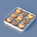 Delicious Homemade Muffins With Nut Topping In White Baking Tray