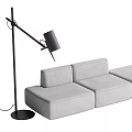 Gray Sectional Sofa With Black Floor Lamp In Modern Living Room