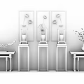 Stylish Console Table Display With Decorative Paintings And Colorful Vases On Wooden Stands