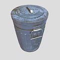 Old Metal Trash Can With Lid Handles And Black Graffiti Design