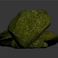 Decorative Green Stones in Various Sizes Arranged in a Curved Line
