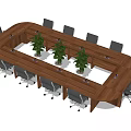 Wooden Office Desk With Black Gray Office Chairs And Green Plants On Tabletop