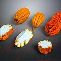 Fresh orange vegetables with white flesh whole and sliced displayed on dark background