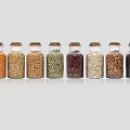 Transparent Glass Spice Jars with Cork Stoppers Holding Various Colored Legumes Neatly on Grey Background