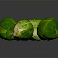 Fresh Green Brussels Sprouts Close Up On Reflective Dark Background