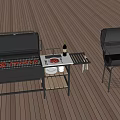 Outdoor Grill Equipment With Open Grill Plates Wine Bottle And Closed Grill On Wooden Deck