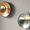 Modern Copper and Silver Textured Wall Lamps with Round Design on Gray Wall 3d model
