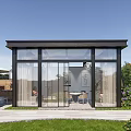 Modern Glass Pavilion with Transparent Walls and Garden Surroundings for Outdoor Leisure