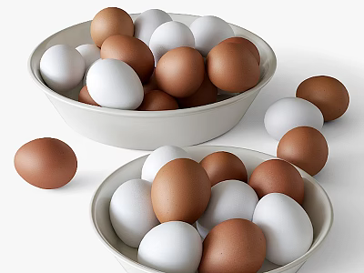 Two Bowls of White and Brown Eggs with Scattered Ones on Surface 3d model