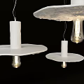 Modern Textured White Pendant Lights With Visible Bulbs Hanging In Black Background