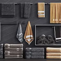 Elegant Gray And Brown Towels Folded Hanging And Rolled On Bathroom Storage Rack