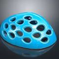 Blue Weapon With Multiple Circular Holes And Helmet Like Protective Structure