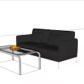Two Seater Gray Sofa with Glass Coffee Table and Fruit Bowl in Living Room
