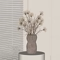 Dried Flowers Arrangement in Ribbed Vase on White Pedestal Against White Blinds